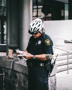 Police officer writing a report