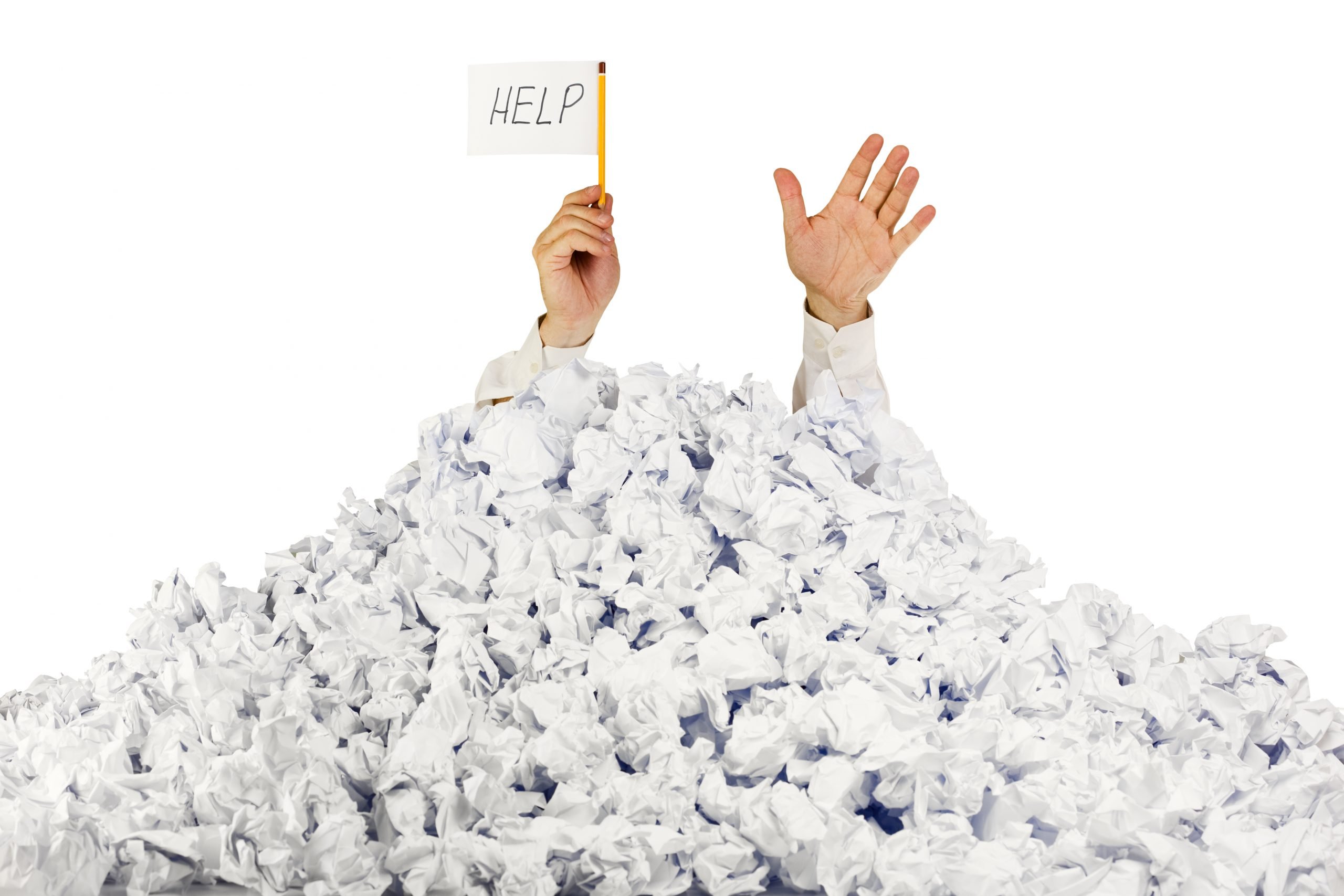 Person under crumpled pile of papers with help sign